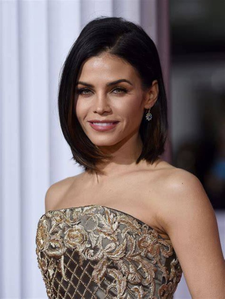 Glamour girl:&nbsp;Jenna Dewan put on a busty display in a jaw-dropping black gown made up of a mesh bodice and an opaque skirt with a dramatic thigh-high slit